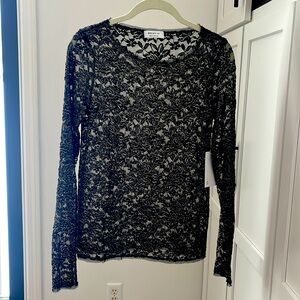 Long sleeve sheer top. New with tag
